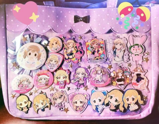 I  basically  finished my Arisa itabag! I want to readjust some of the merch slightly so they fit...